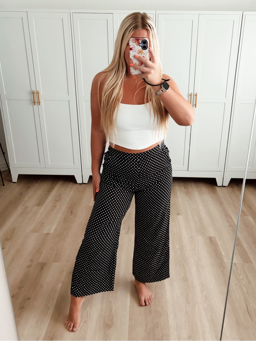 Black and white polka dot high waisted wide leg pants